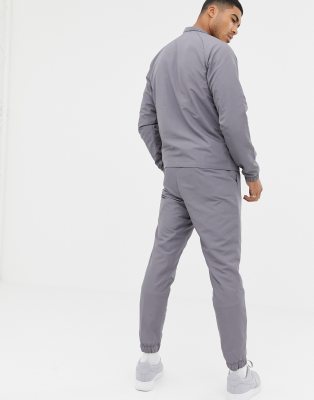 nike woven tracksuit grey