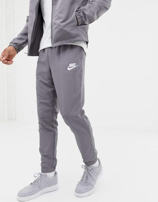 Nike woven 2025 tracksuit grey