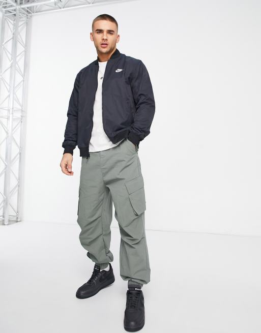 Nike woven unlined bomber jacket in black | ASOS
