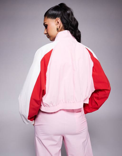 Nike woven windrunner jacket in pink and red ASOS