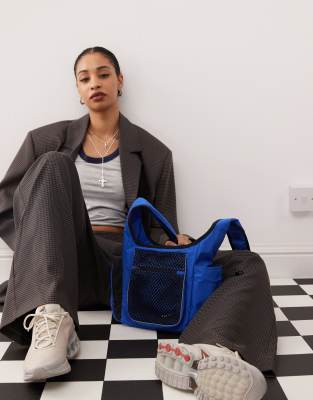 Nike x Tega cross body bag in blue