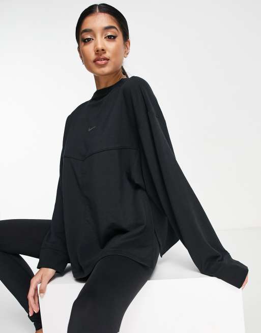 Nike Yoga Dri-FIT fleece crew in black | ASOS