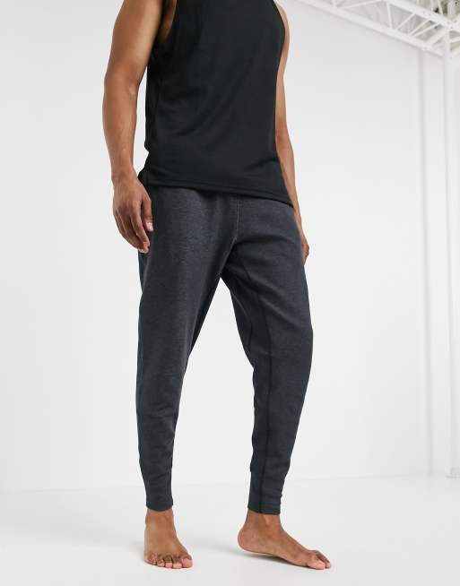 Nike Yoga joggers in dark grey