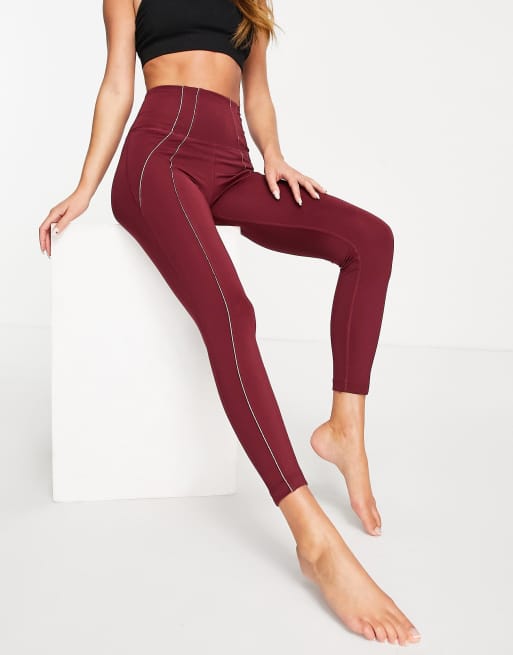 Nike Road To Wellness leggings in burgundy