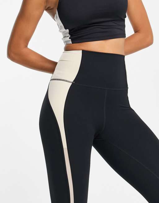 Nike Yoga Dri-FIT Luxe high-waisted 7/8 colorblock leggings in black