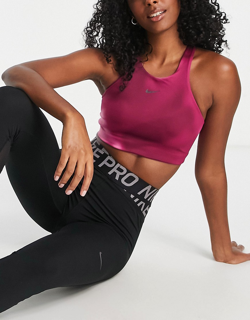 Nike - Yoga Dri-FIT - Reggiseno sportivo a sostegno medio con logo Nike e stampa fantasia, colore rosa