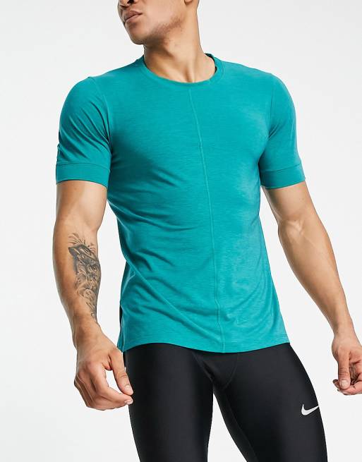 Nike Yoga - Dri-FIT - Sneldrogend T-shirt in gemêleerd blauwgroen