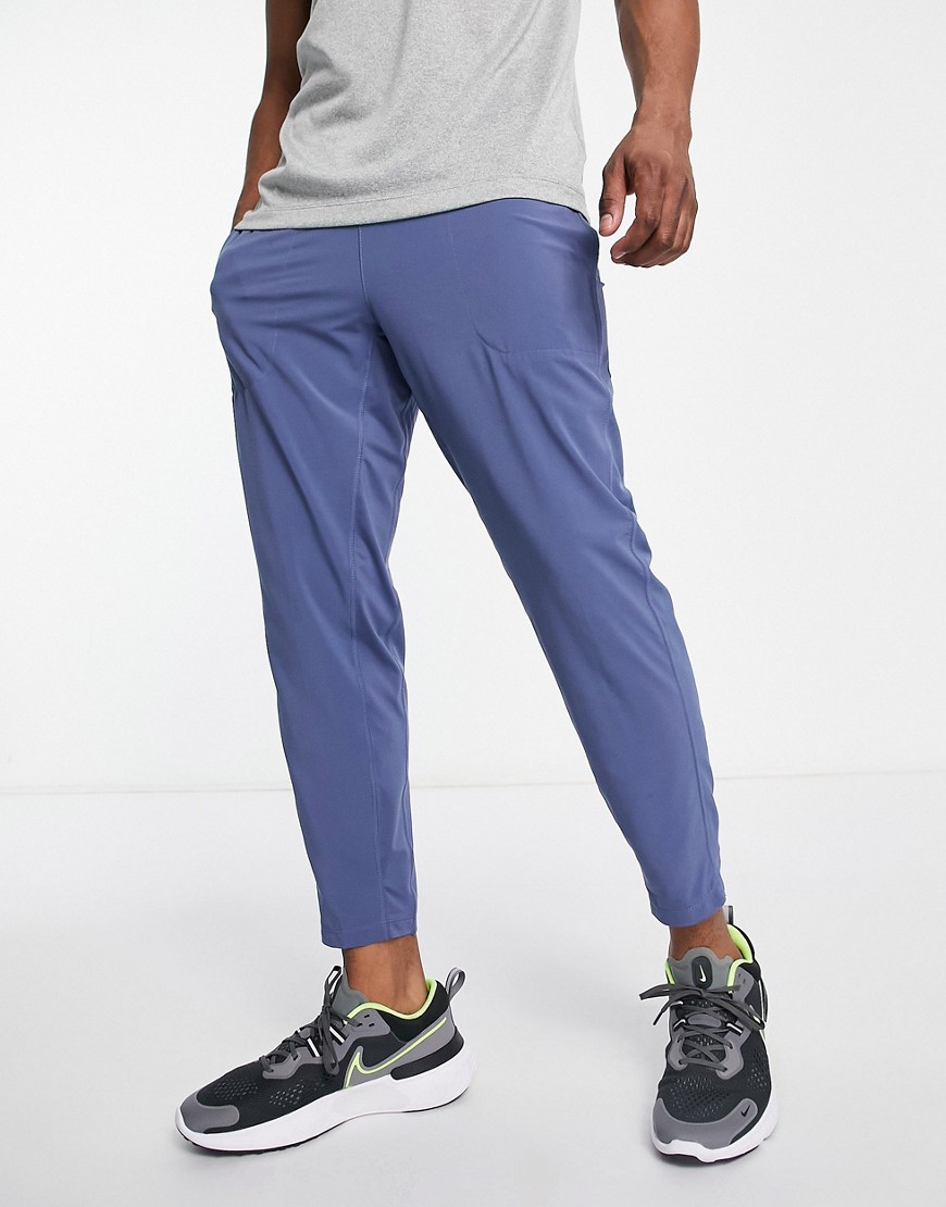Nike Yoga Flex tapered joggers in blue
