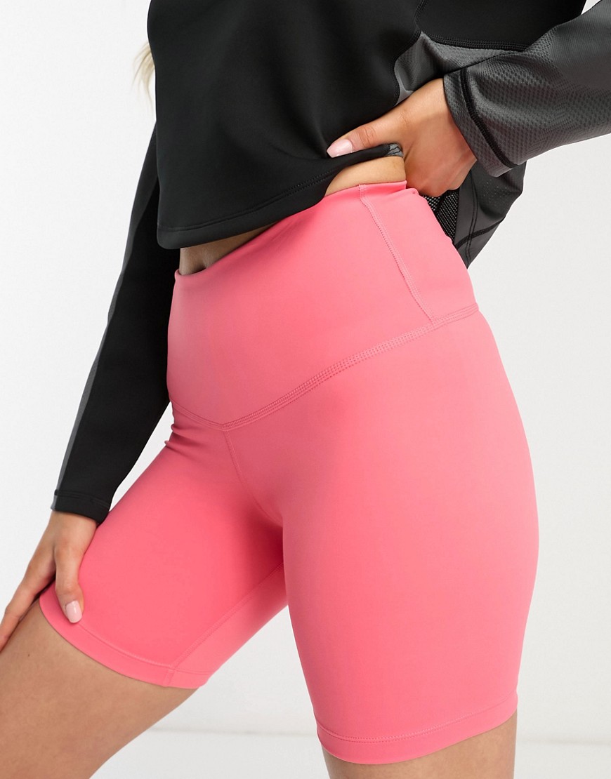 Nike Yoga high rise 7 inch shorts in pink