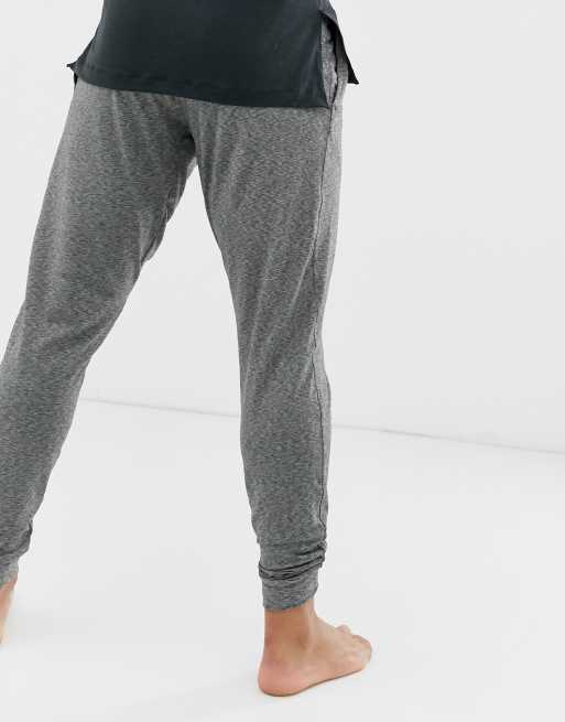 Nike Yoga joggers in dark grey