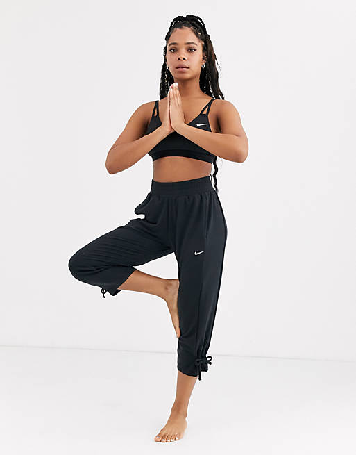 Nike Yoga loose fit trousers with tie detail in black