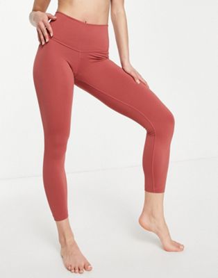 Nike Yoga Luxe 7/8 leggings in dark pink
