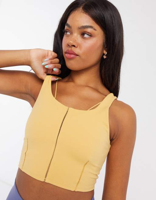 Nike Yoga luxe crop top with stitch detail in yellow