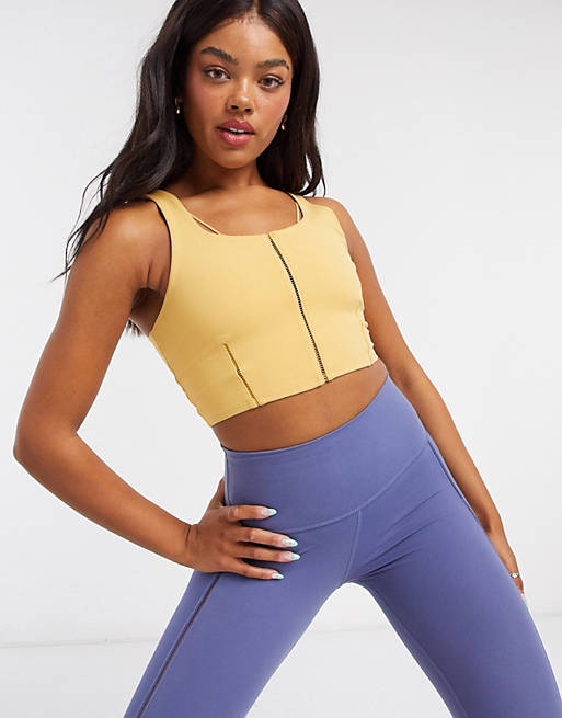 Nike Yoga luxe crop top with stitch detail in yellow