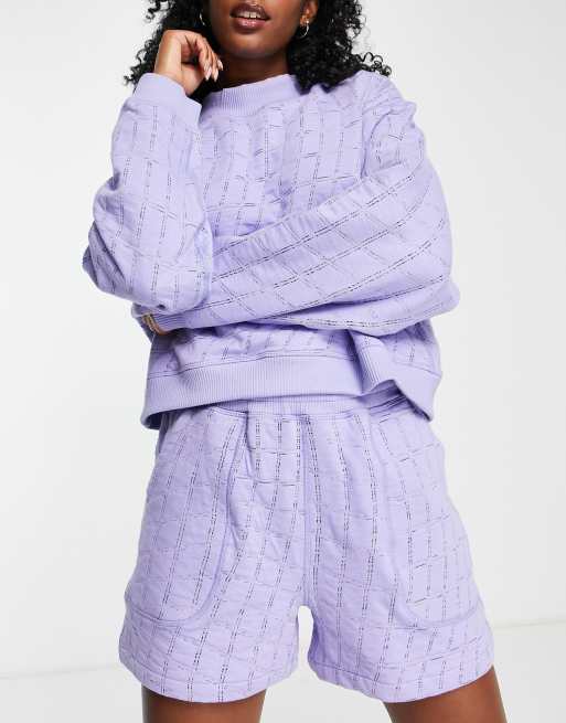 https://images.asos-media.com/products/nike-yoga-luxe-therma-fit-cozy-reversible-fleece-shorts/202339333-1-lilac?$n_640w$&wid=513&fit=constrain