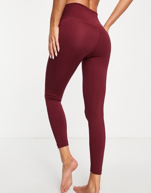 Nike Yoga metallic trim 7/8 leggings in burgundy