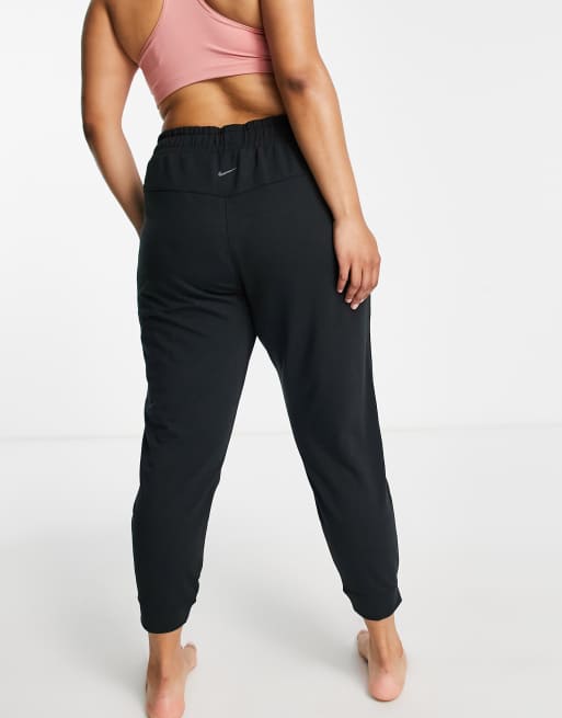 Nike Yoga Dri-FIT Womens 7/8 Fleece Joggers.