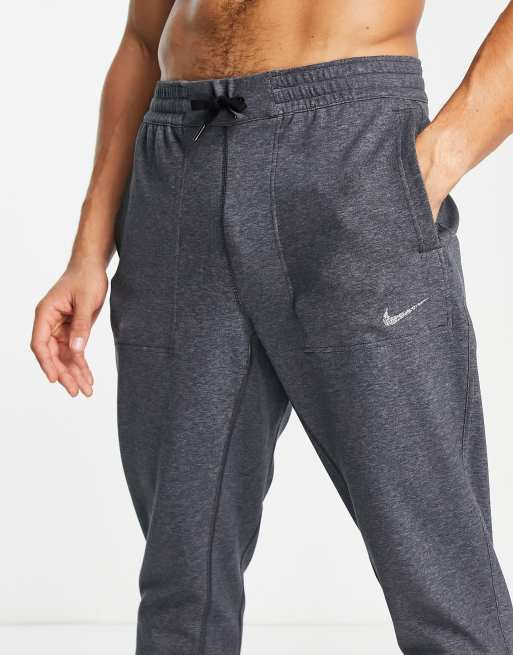 Nike Yoga joggers in dark grey