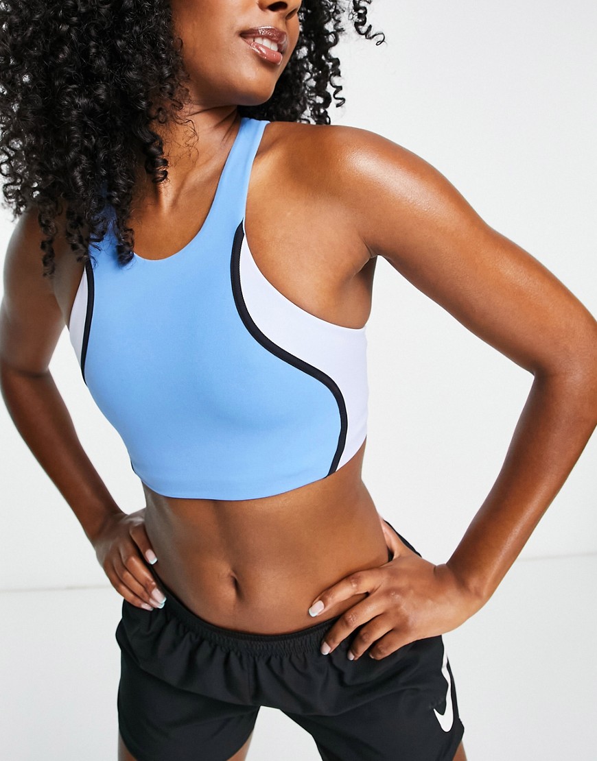 Nike Yoga Swoosh Dri-FIT cut and sew medium support sports bra in blue