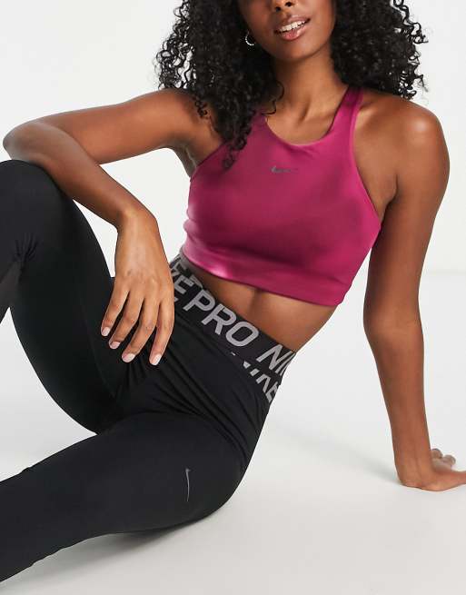 Nike Yoga Swoosh Dri-FIT medium support sports bra in patterned pi nk