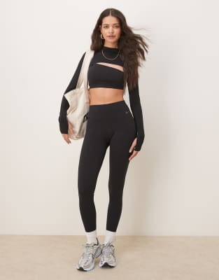 asos Nike Zenvy Training Dri-FIT long sleeved shrug top and high waisted leggings in black