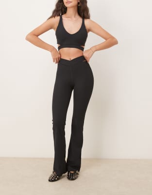 asos Nike Zenvy Training Dri-FIT ribbed cut out high waisted flares and sports bra and leggings in black