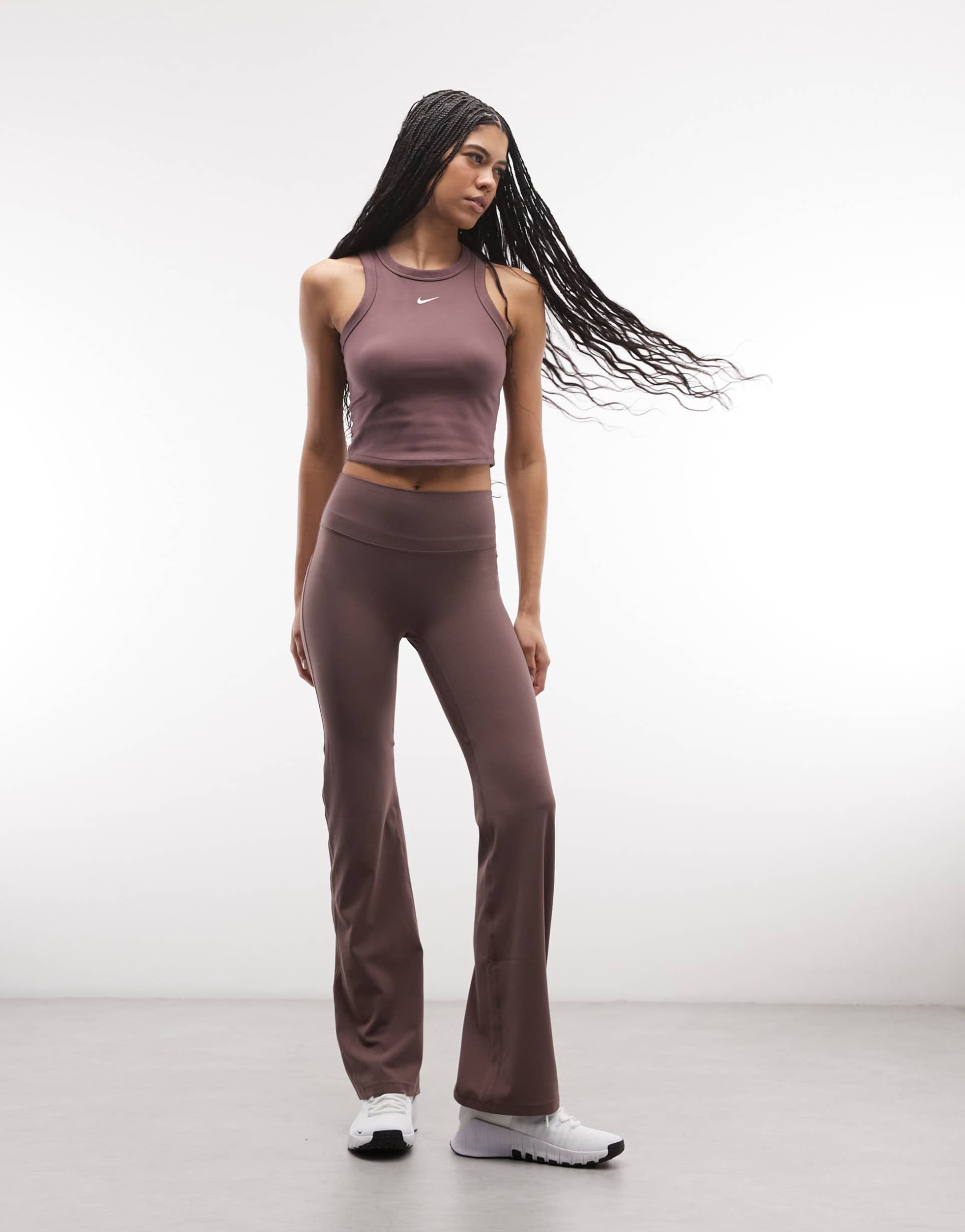 nike zenvy training high rise flare leggings in brown