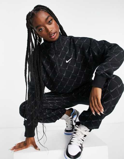 Nike best sale printed tracksuit