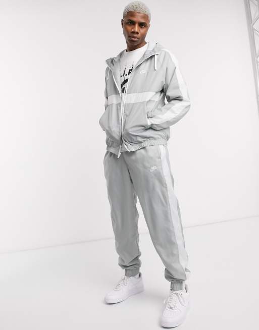 Nike woven tracksuit store set in grey