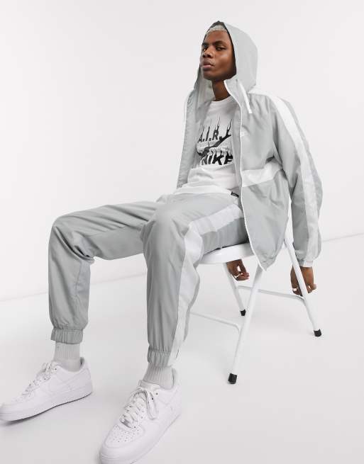 Nike woven tracksuit set in sale grey