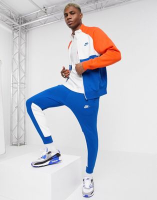 Nike zip-through tracksuit set in blue 