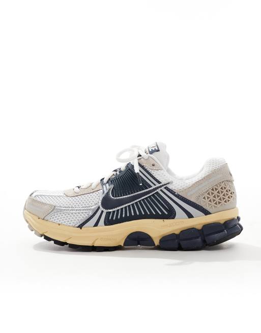 Nike Air Zoom Vomero 5 trainers in white and navy