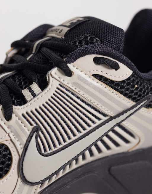 Nike Zoom Vomero 5 sneakers in black and metallic silver , 4 of 5