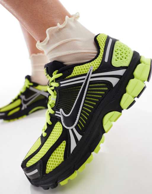 Nike Zoom Vomero 5 sneakers in black and yellow