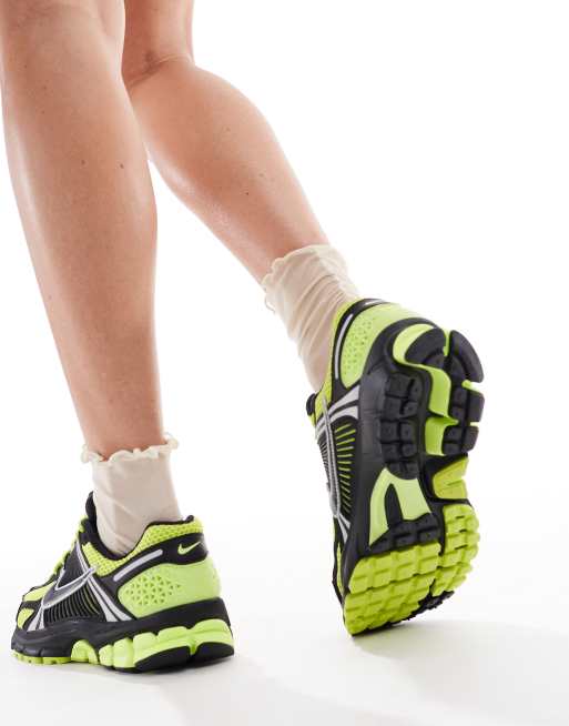 Nike Zoom Vomero 5 sneakers in black and yellow