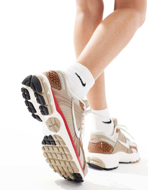 Nike Zoom Vomero 5 sneakers in brown and red