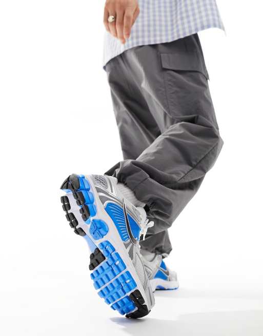 Nike Zoom Vomero 5 sneakers in white and blue