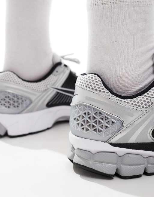 Nike Air Zoom Vomero 5 sneakers in silver and black