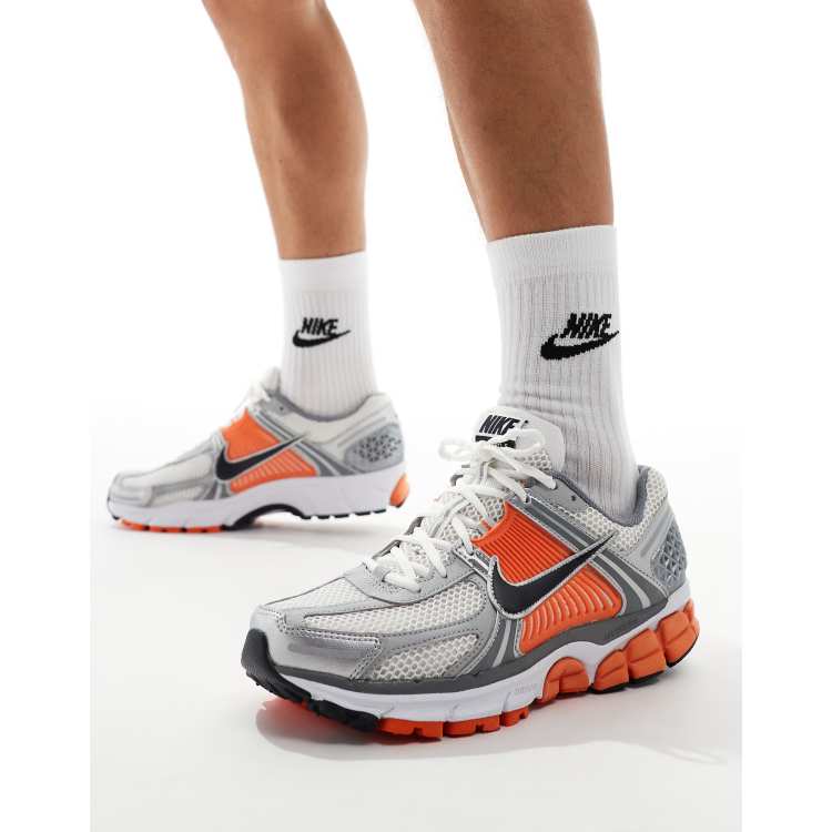 Nike Zoom Vomero 5 sneakers in silver and orange ASOS
