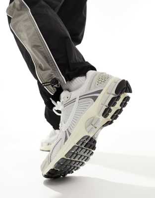 Nike Zoom Vomero 5 sneakers in white and gray