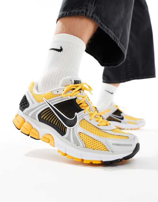 Nike shoes black yellow best sale