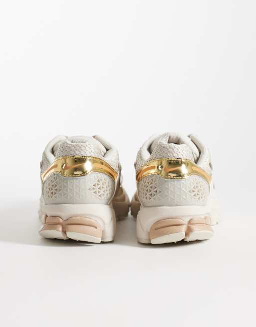 Nike Zoom Vomero 5 trainers in metallic gold, 4 of 5