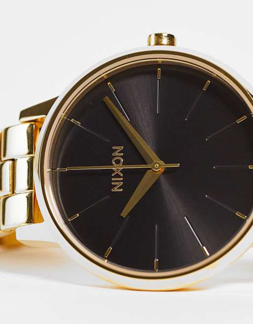Nixon – Kensington – Armbanduhr in Gold und Schwarz ASOS
