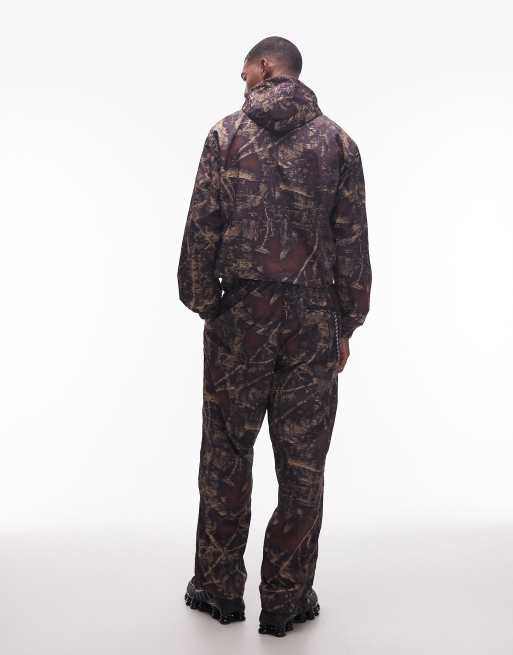 No Problemo glitch nylon co-ord broek in donker camoprint, 3 van 5