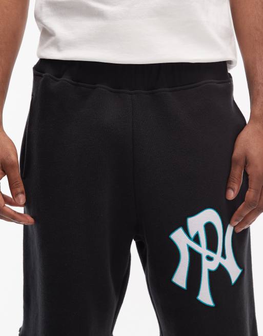 No Problemo – Svarta sweatshorts i bomullsrikt tyg med NYP-logga och råskuren fåll, 4 av 5