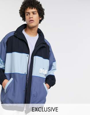 Noak wadded cut and sew jacket in black and blue