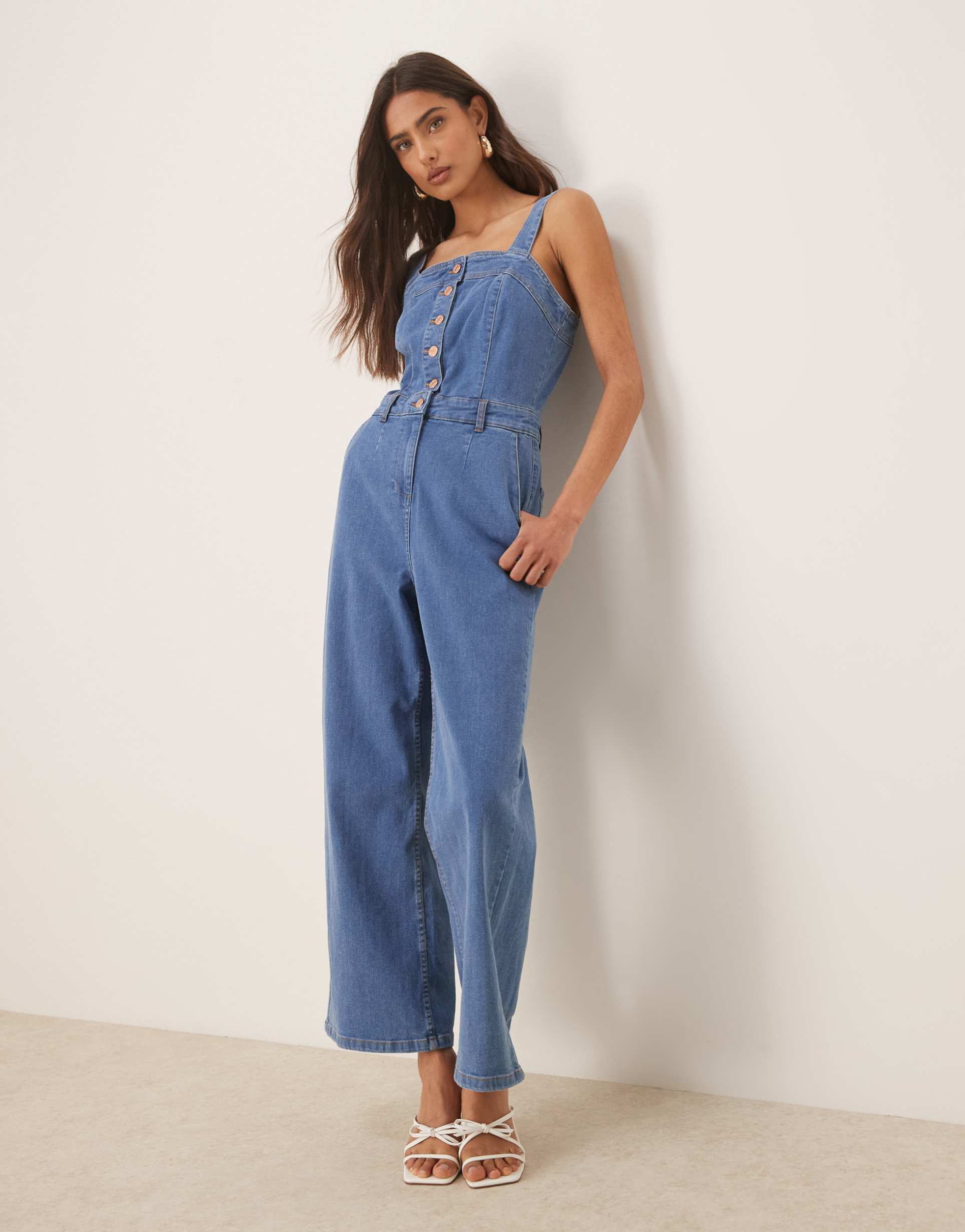 nobody's child aster button strappy denim jumpsuit in mid wash