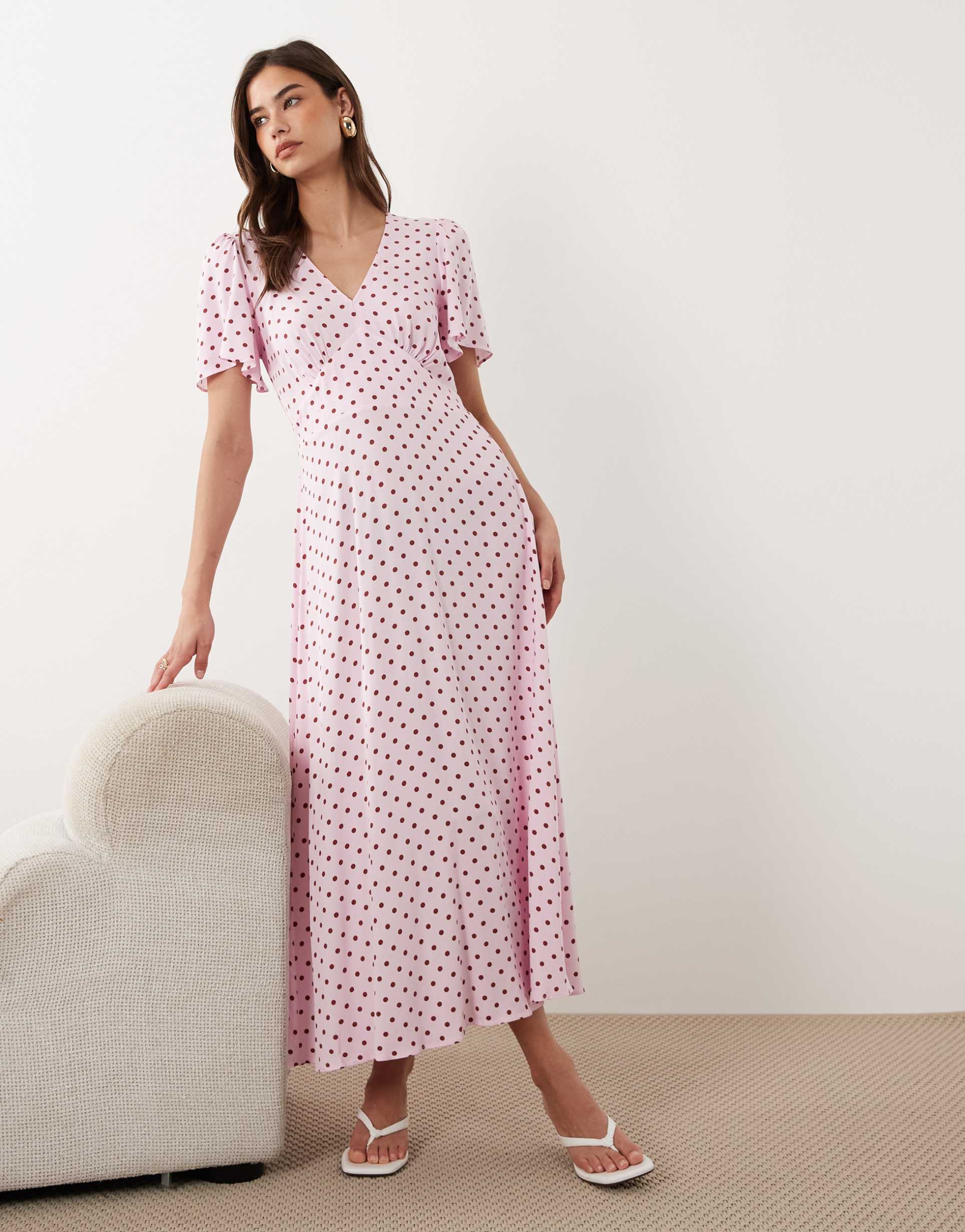nobody's child atlas v-neck short flutter sleeves midi dress in pink polka dot