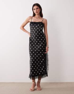 Nobody's Child - Betsi - Midikleid aus Satin in Schwarz mit Spitzenbesatz und Polka Dots