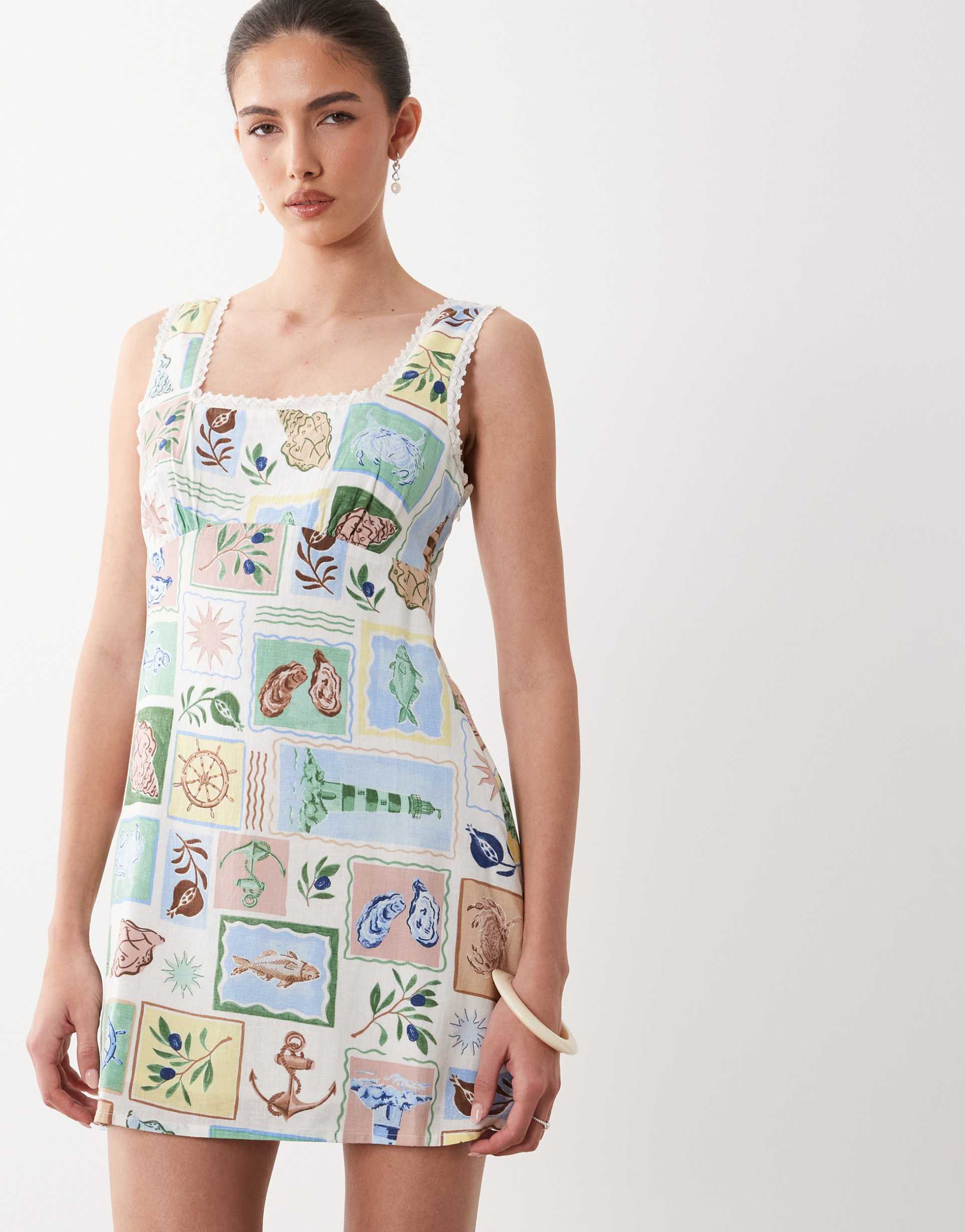 nobody's child ciara square neck sleeveless mini dress in postcard print